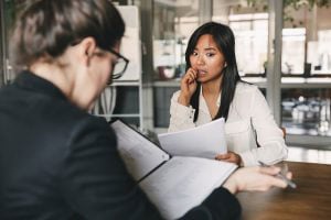 Nervous business woman with prospect