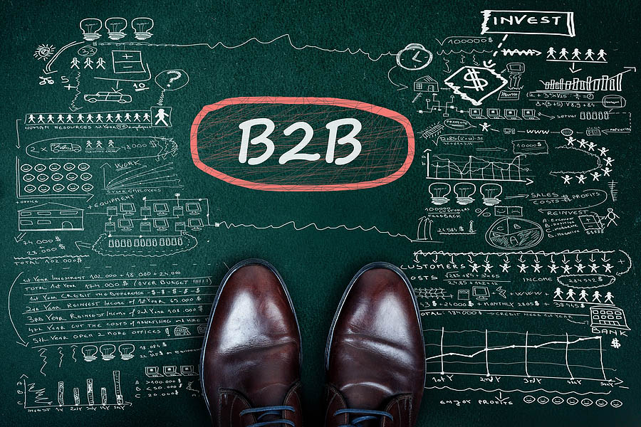 B2B word and business shoes on chalkboard